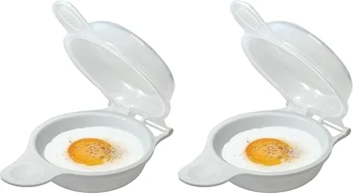 A completed egg breakfast plated next to the cleaned egg cooker