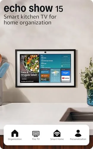 Amazon Echo Show 15 mounted on a kitchen wall beside a counter