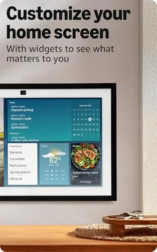 Echo Show 15 used for a video call with the camera shutter open on a desk