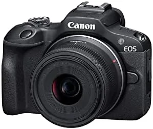 A close view of the top controls and mode dial on the EOS R100