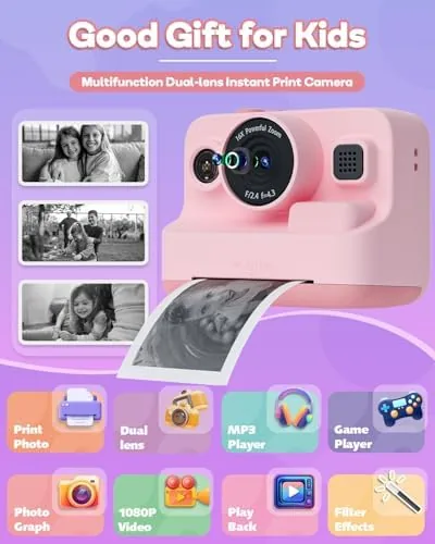 A close view of the lens, selfie mirror, and shutter on the pink camera