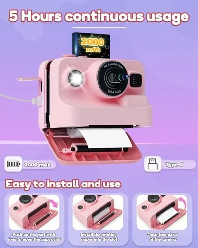 The camera beside a fresh roll of thermal paper and its charging cable