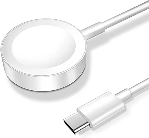 Apple Watch Ultra charging on the magnetic puck at a hotel desk