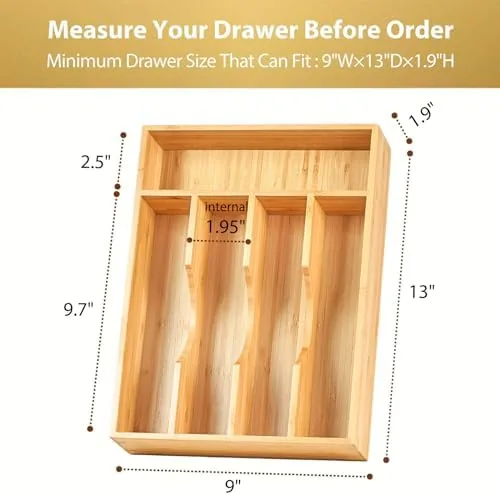 The bamboo tray lifted from the drawer and held upright to show the integrated dividers