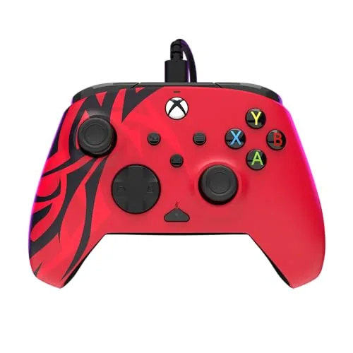 Spirit Red controller held in a hand during a gaming session