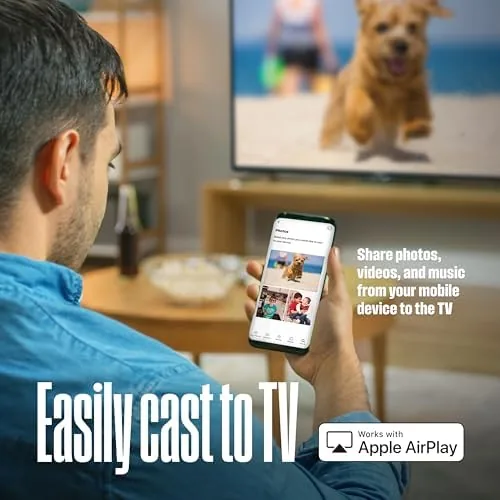 Two televisions side by side comparing the Westinghouse with a premium QLED model