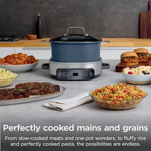 The PossibleCooker Pro next to an electric pressure cooker and a slow cooker