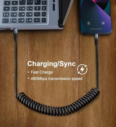 A straight cable, a retractable cable, and the coiled cable laid side by side