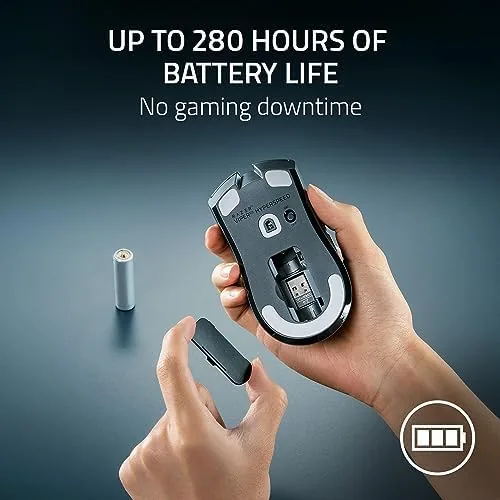 A hand gripping the mouse during a fast paced gaming session