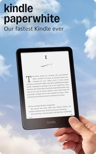 Like-new Kindle Paperwhite 16GB in black, powered on and showing a book page