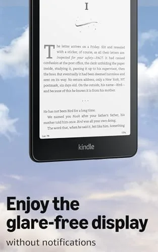 Kindle Paperwhite Signature Edition placed on a wireless Qi charging mat