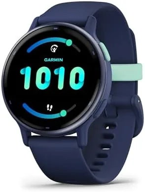 The charging cable connected to the vívoactive 5 with the battery screen showing a high percentage