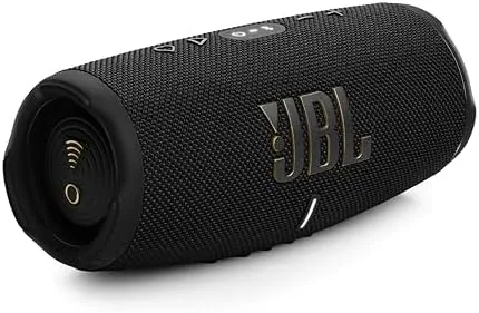 The JBL Charge 5 Wi-Fi speaker standing upright in a modern living room