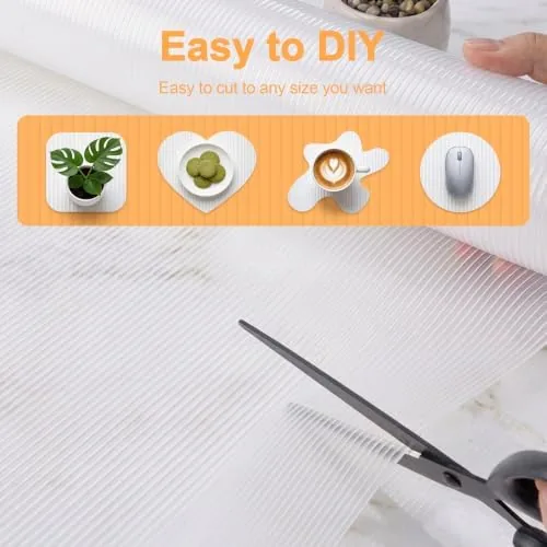 The liner in a kitchen drawer holding silverware in place as the drawer moves