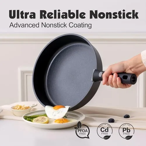 Over easy eggs sliding out of the nonstick frying pan with no oil