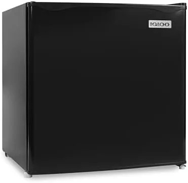 Igloo 1.6 cubic foot mini fridge with its single door open in a dorm room