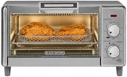 BLACK+DECKER 4 slice air fry toaster oven sitting on a kitchen counter