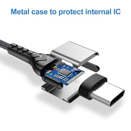 Laptop charging through the USB C cable at a desk