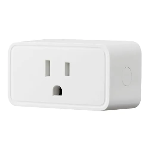 A white Amazon Basics smart plug plugged into a wall outlet