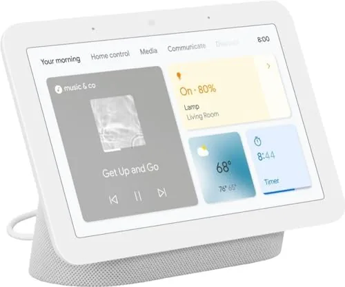 Google Nest Hub on a kitchen counter showing the time and weather