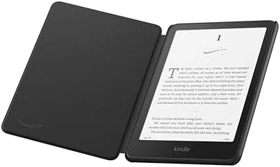 Hand holding the Kindle in the case while reading on a couch