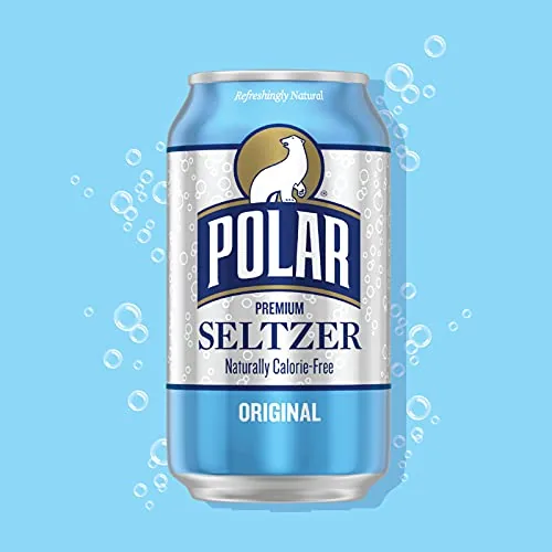 A glass of Polar seltzer with fine bubbles rising to the surface