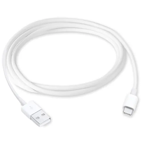 A USB A to USB C CarPlay cable coiled on a car center console