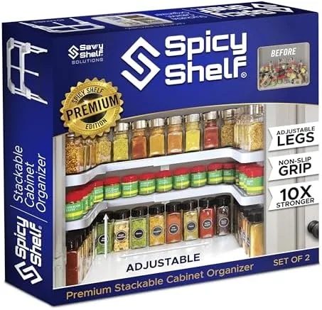 Expandable two tiered spice rack inside a kitchen cabinet