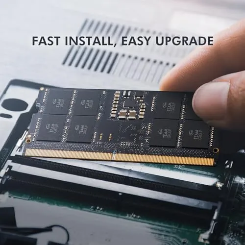 A laptop running a heavy multitasking session with a memory usage graph showing 32GB