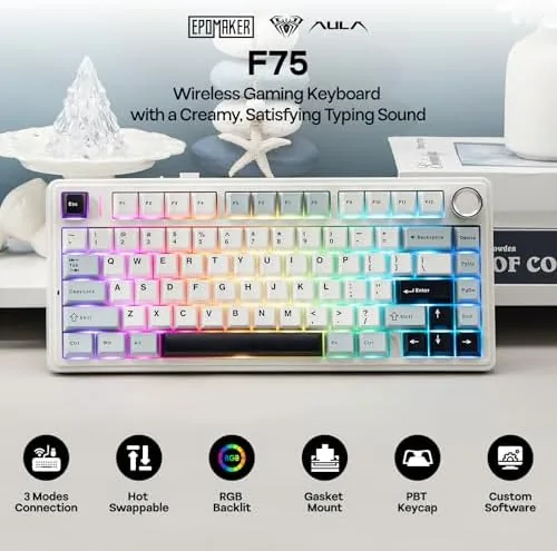 A close view of the keycaps and the rotary volume knob in the corner