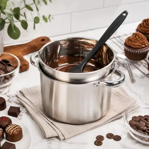 Melted chocolate being stirred with the silicone spatula in the melting cup