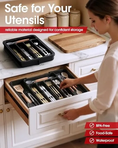 Forks and knives arranged in the adjustable cutlery slots