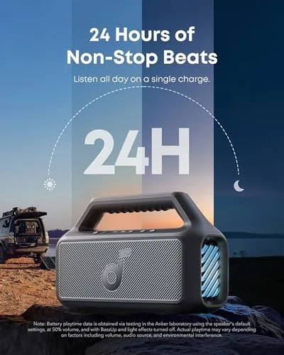 Boom 2 speaker playing music beside a grill at a backyard cookout