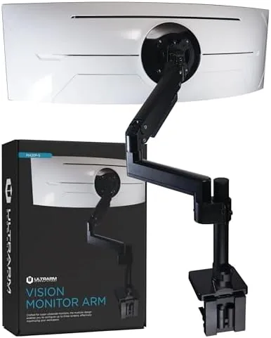 The heavy duty monitor arm holding a 57 inch curved ultrawide monitor above a desk