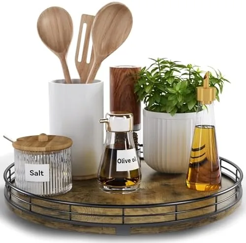 Round wooden lazy susan on a kitchen countertop holding condiment bottles