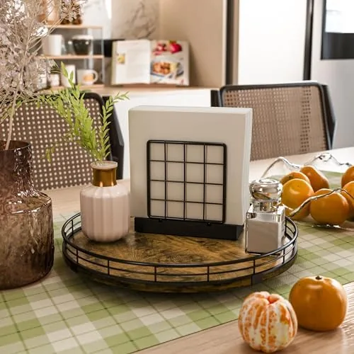 Lazy susan on a bathroom vanity holding soap and a candle
