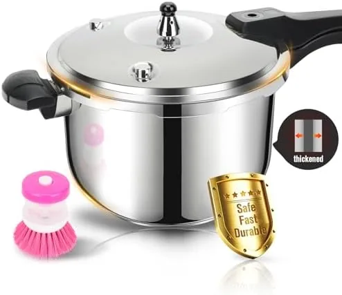 The 8 quart stainless steel pressure cooker on a stovetop with steam rising from the valve