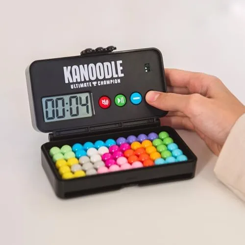 Hands rearranging Kanoodle pieces while working through a challenge