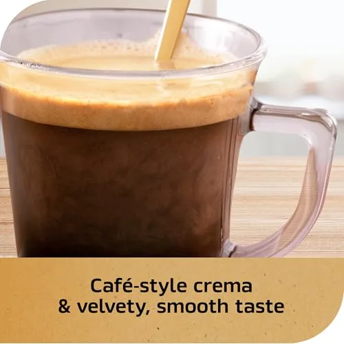 A mug of espresso with milk showing the creamy finish of the blonde brew