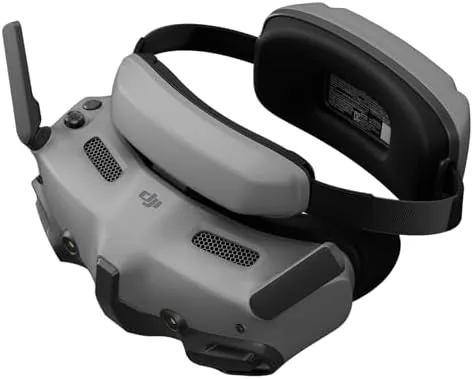 DJI Goggles 3 FPV headset on a table with the antennas raised