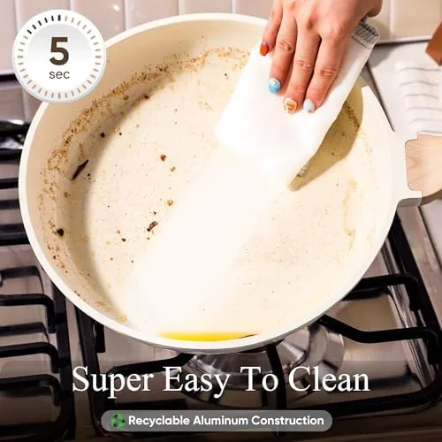 The CAROTE nonstick set next to a stainless steel set and a cast iron pan