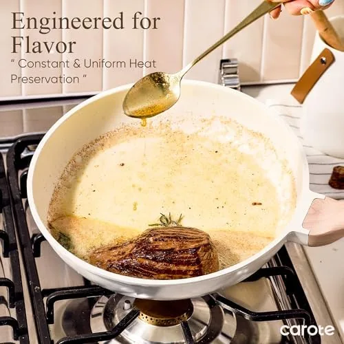 The CAROTE frying pan being washed clean with a sponge after cooking