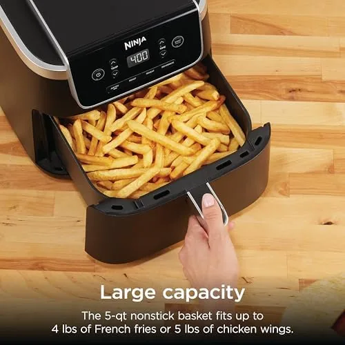 A basket of fries cooking inside the Ninja Air Fryer Pro