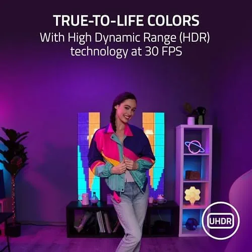 A streamer using the Kiyo Pro Ultra with a softbox light in the background