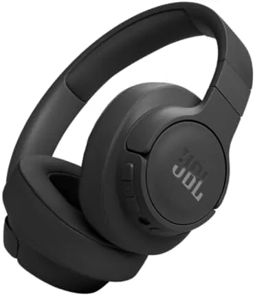 The JBL Tune 770NC over-ear headphones in black resting on a desk