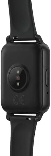 The Galaxy Fit 3 charging magnetically on its cradle