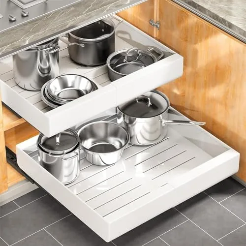 The white Kitstorack pull out cabinet organizer installed in a base cabinet