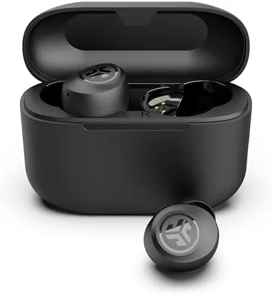 The JLab Go Air Pop+ case next to a phone being charged