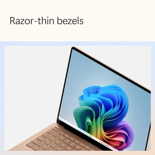 The Surface Laptop closed in the Dune color on a table