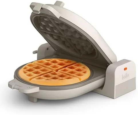 The bella waffle maker in oatmilk finish on a kitchen counter